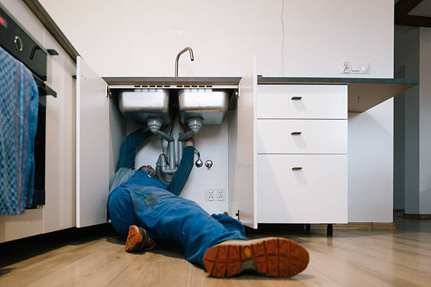 Professional Drain Cleaning technician working in Avilla, AR